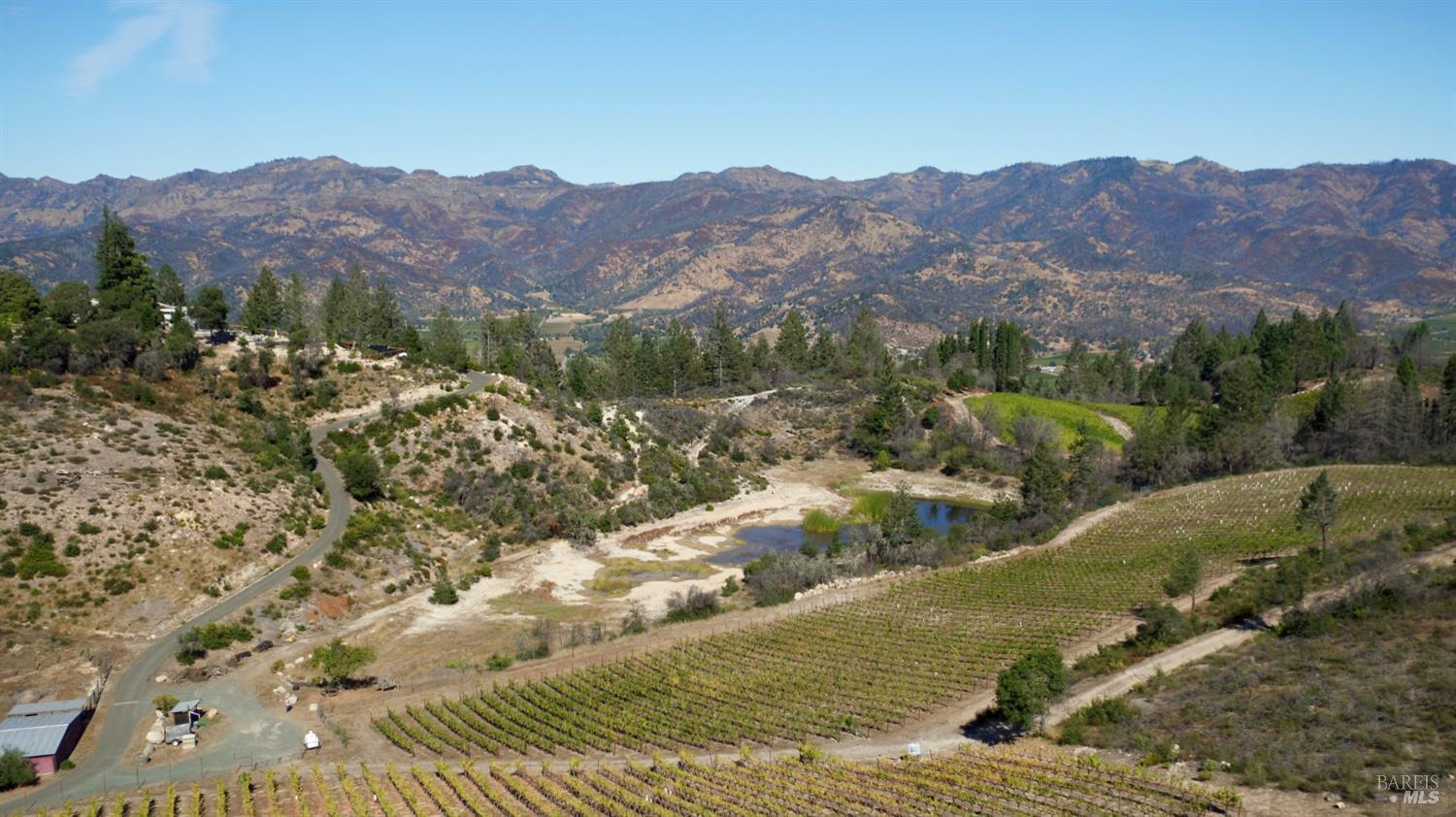 1755 Diamond Mountain Road Calistoga, CA 94515 - Photo 57 of 67 a view of a city with mountains in the background