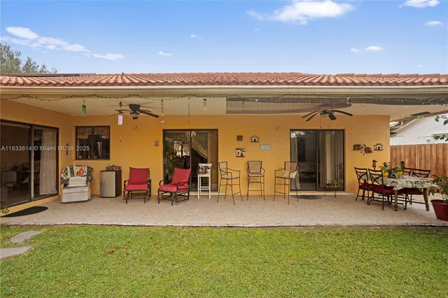a view of a terrace with furniture