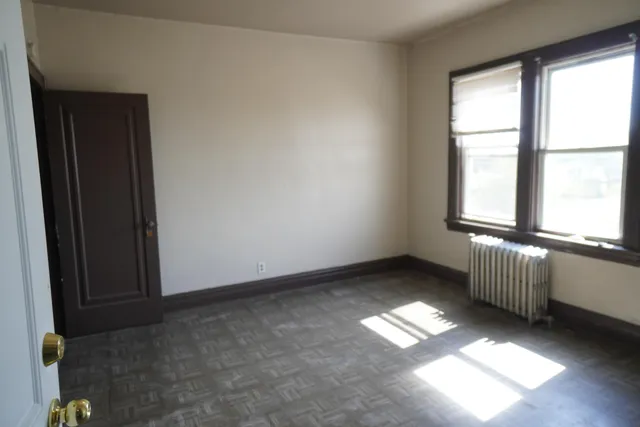 an empty room with windows