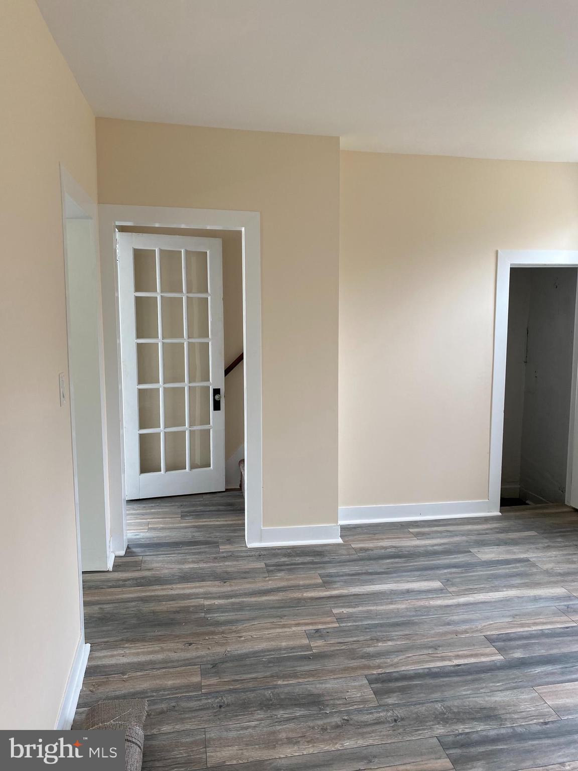 261 Berlin Road Clementon, NJ 08021 - Photo 15 of 45 living room with glass door to enclosed porch