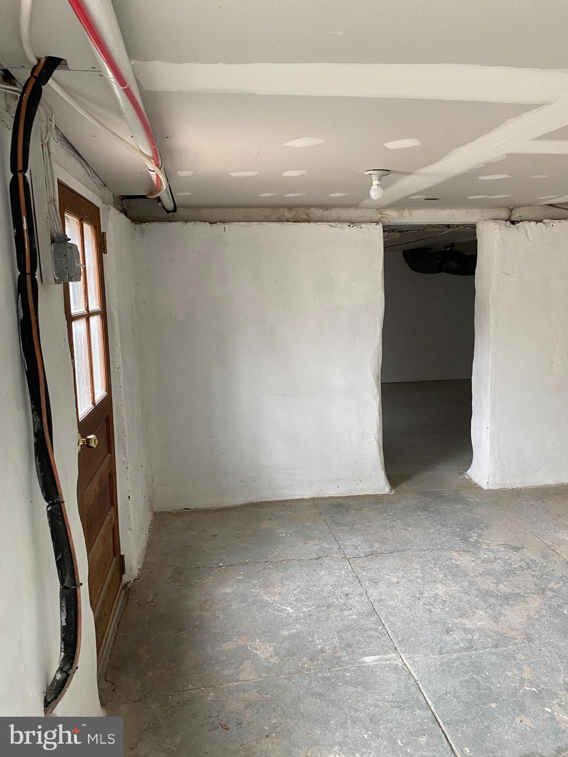 261 Berlin Road Clementon, NJ 08021 - Photo 31 of 45 basement with door way to attached garage