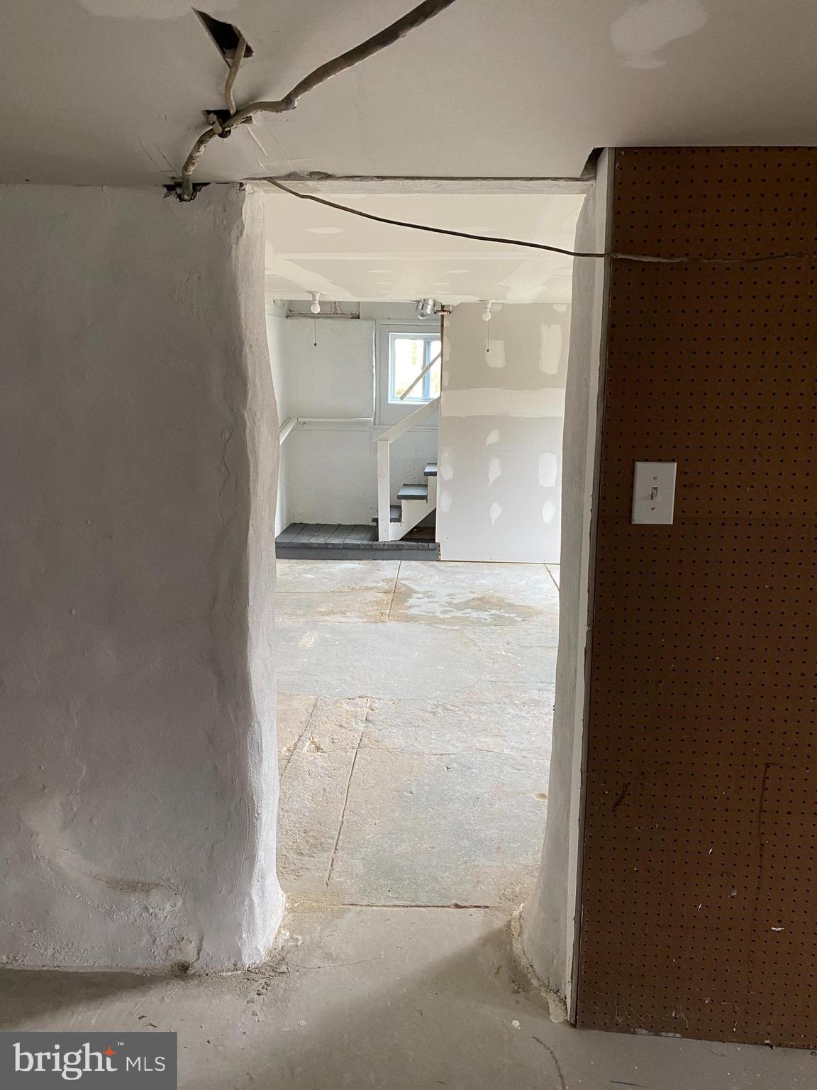 261 Berlin Road Clementon, NJ 08021 - Photo 33 of 45 basement entrance to attached garage/workshop