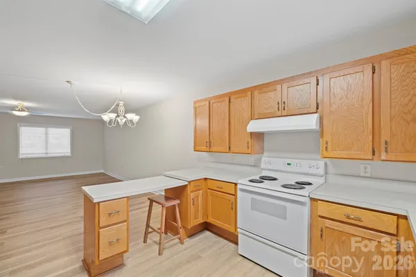 a spacious bathroom with a double vanity sink and a mirror