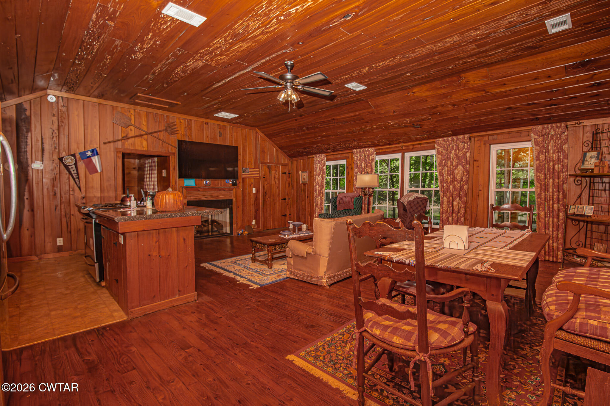 445 Wesley Lake Road Brownsville, TN 38012 - Photo 8 of 21 a view of a dining room with furniture a chandelier and wooden floor