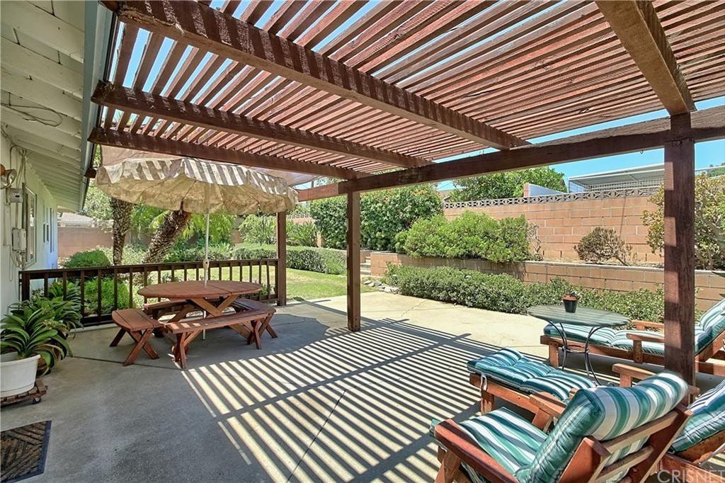 1659 Edgemont Drive Camarillo, CA 93010 - Photo 23 of 28 a view of a patio with lawn chairs next to a yard