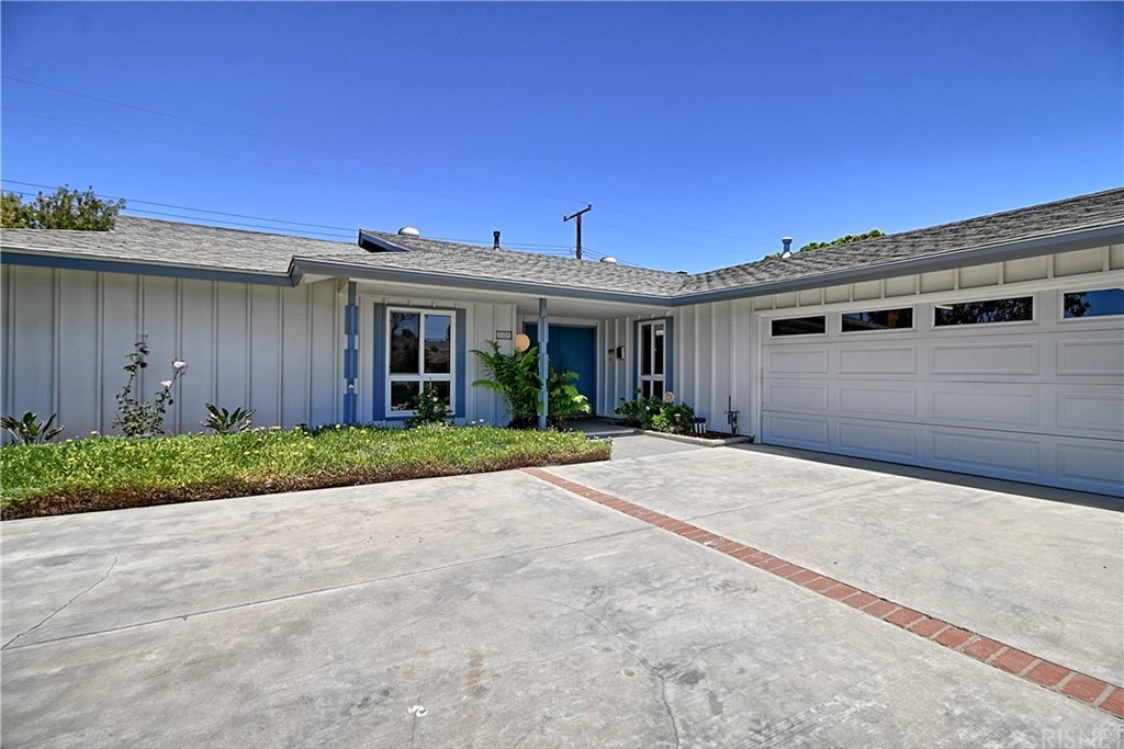 1659 Edgemont Drive Camarillo, CA 93010 - Photo 4 of 28 a front view of a house with a yard and garage