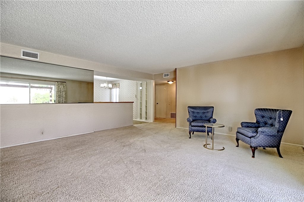 1659 Edgemont Drive Camarillo, CA 93010 - Photo 8 of 28 a living room with furniture and a chair