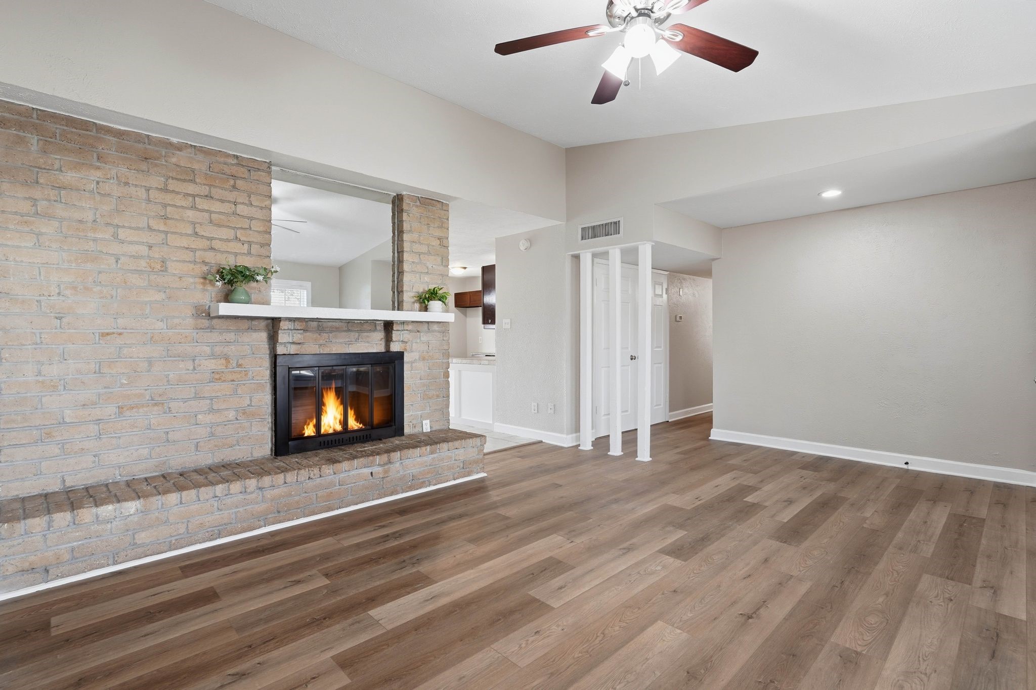 17223 Ranch Country Road Hockley, TX 77447 - Photo 7 of 36 This room is spacious with plenty of ways to arrange your furniture and an extended fireplace for that wow factor.