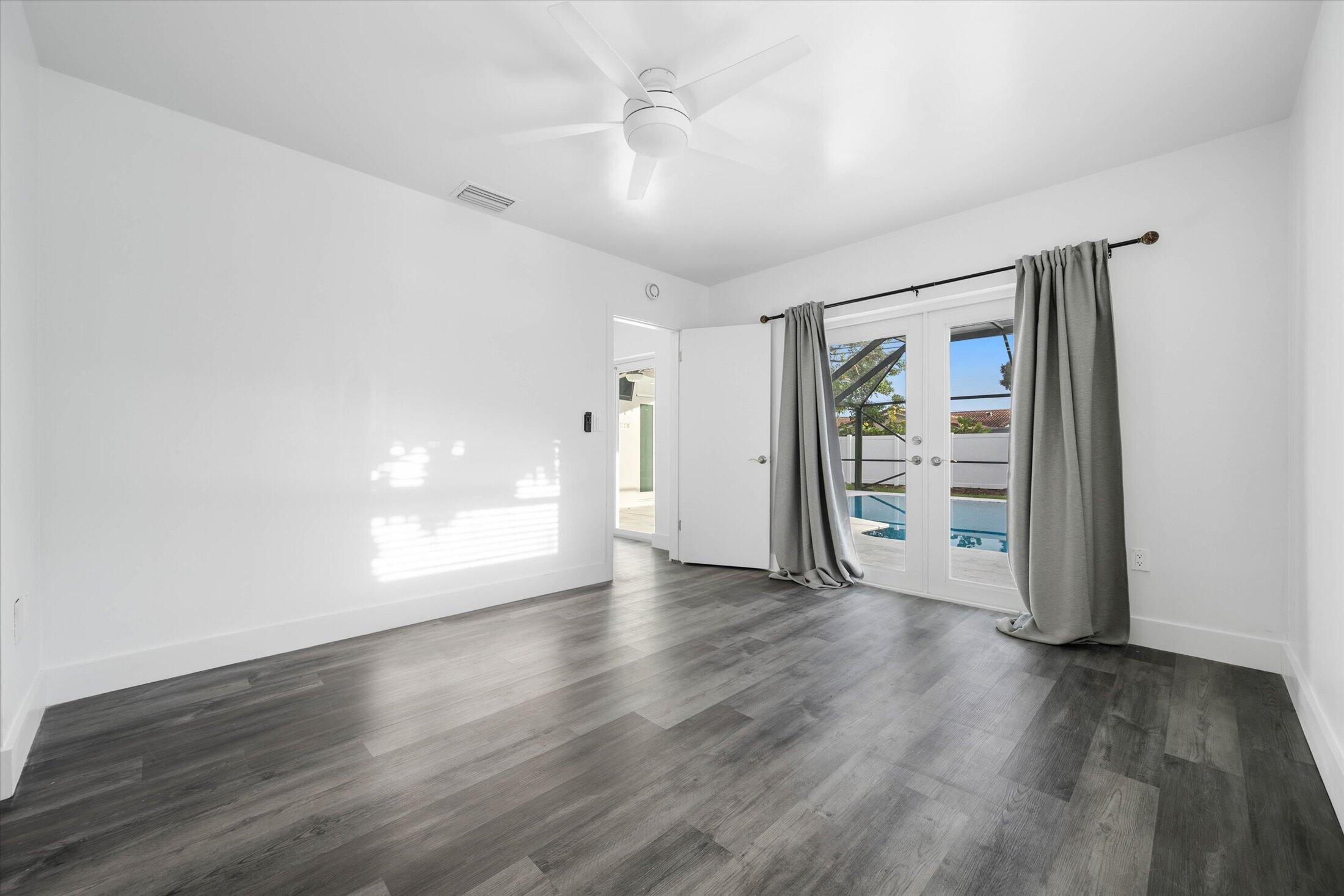 1650 Northwest 9th Street Boca Raton, FL 33486 - Photo 22 of 38 Primary Bedroom