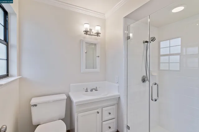 a bathroom with a sink a vanity and a mirror