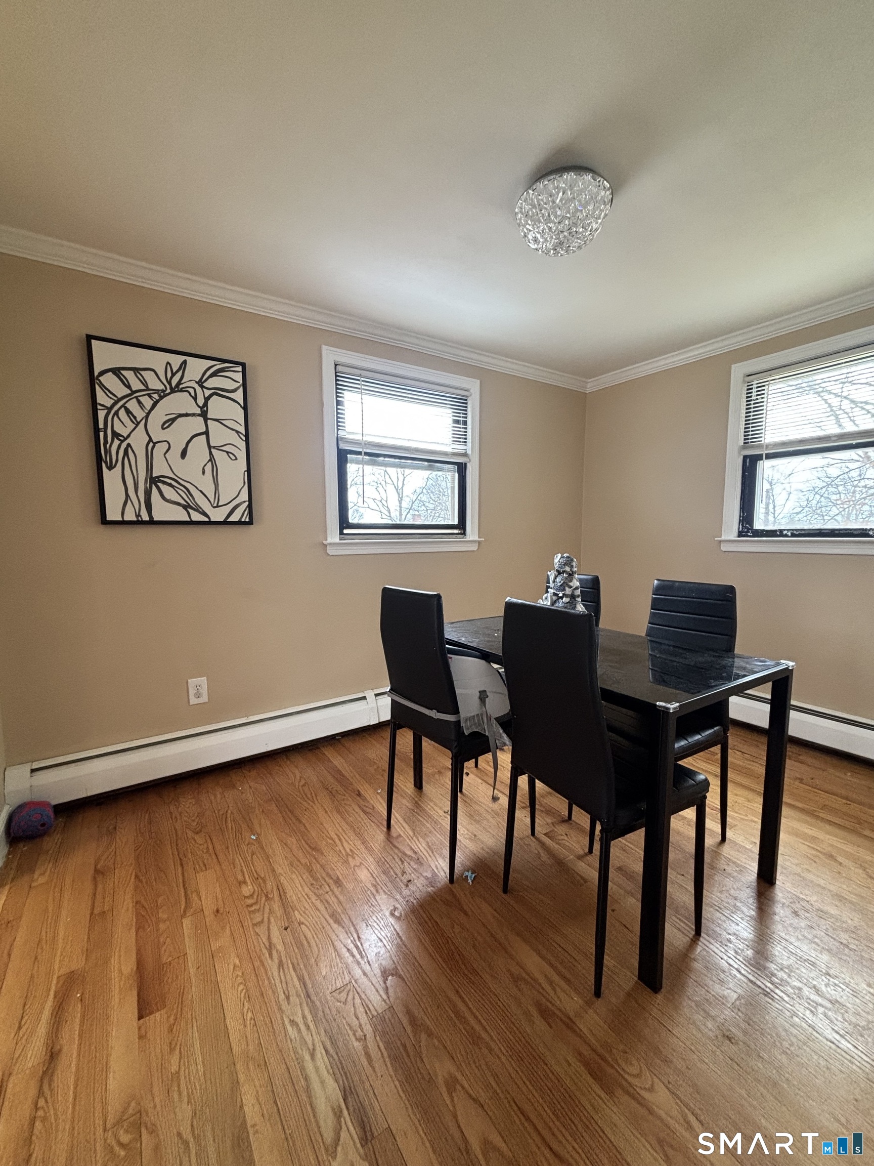 117 Arden Road Waterbury, CT 06708 - Photo 12 of 30 a view of a workspace with furniture and wooden floor