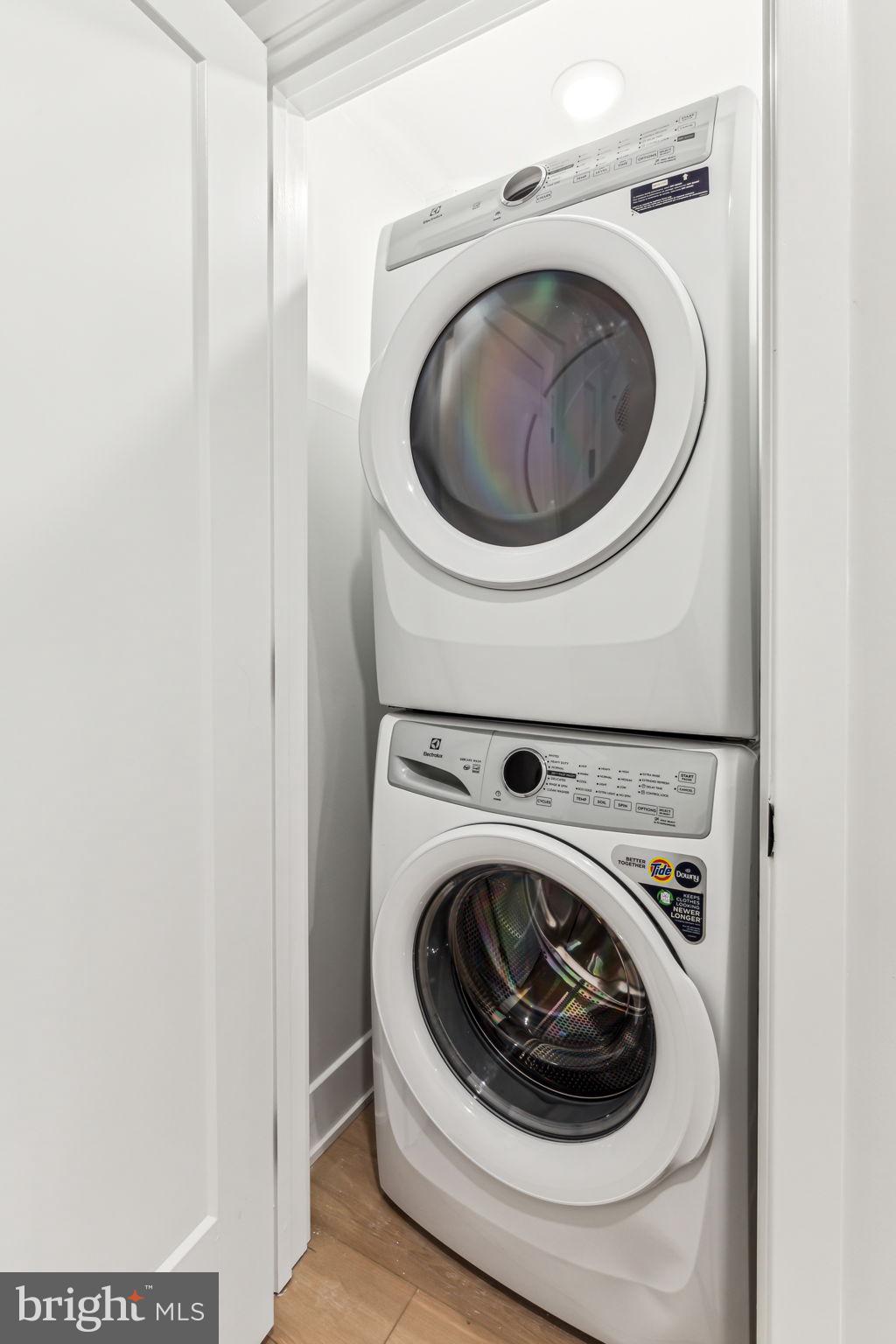 6910 Ridge Avenue, Unit 419 Philadelphia, PA 19128 - Photo 14 of 18 a utility room with dryer and washer