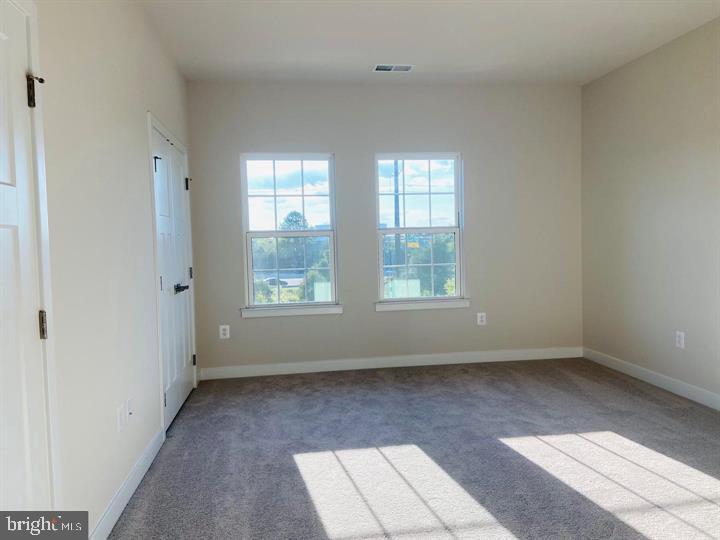 2640 Jetstream Road Herndon, VA 20171 - Photo 13 of 20 a view of room with window and hardwood floor
