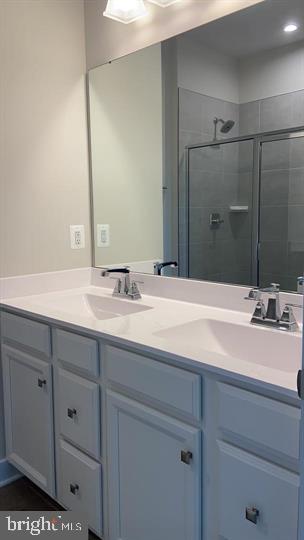 2640 Jetstream Road Herndon, VA 20171 - Photo 15 of 20 a bathroom with a sink and a mirror