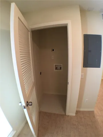 a bathroom with a shower and a sink