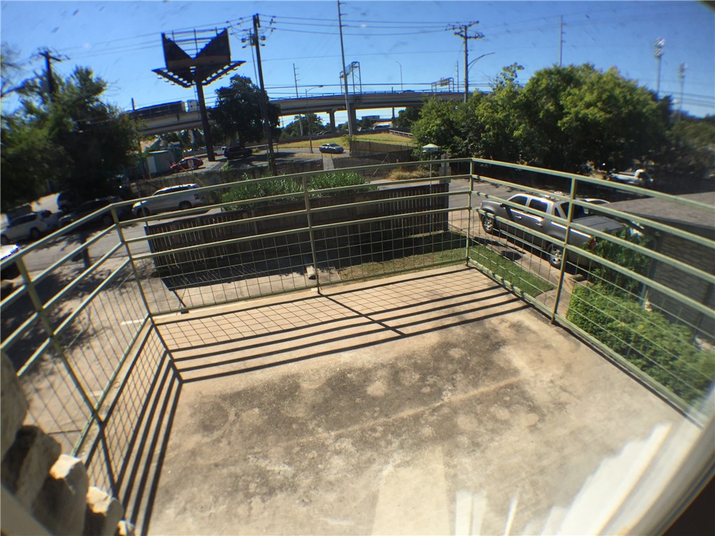 2800 Cole Street, Unit 201C Austin, TX 78705 - Photo 9 of 16 a view of backyard with wooden floor and a potted plant