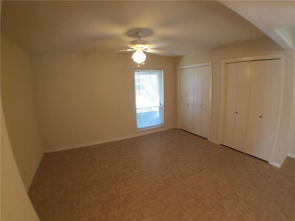 2800 Cole Street, Unit 201C Austin, TX 78705 - Photo 10 of 16 a view of an empty room with a window