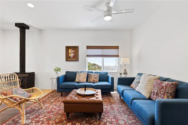 a large kitchen with lots of counter top space and stainless steel appliances
