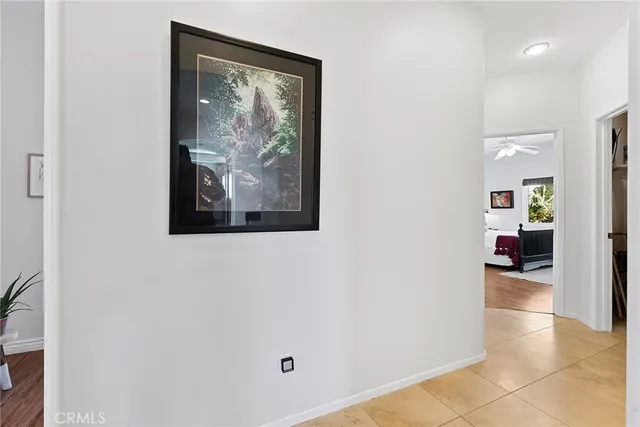 a kitchen with a stove a sink and a refrigerator