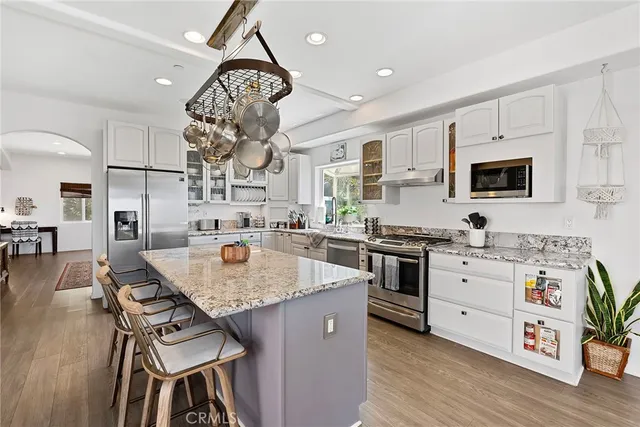 a view of room with stairs and furniture