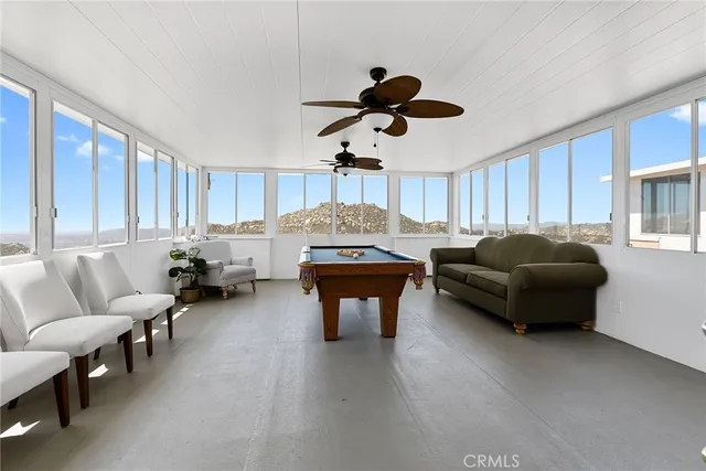 a bed room with a bed and a window