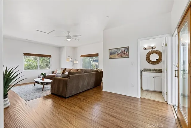 an aerial view of a houses with a yard