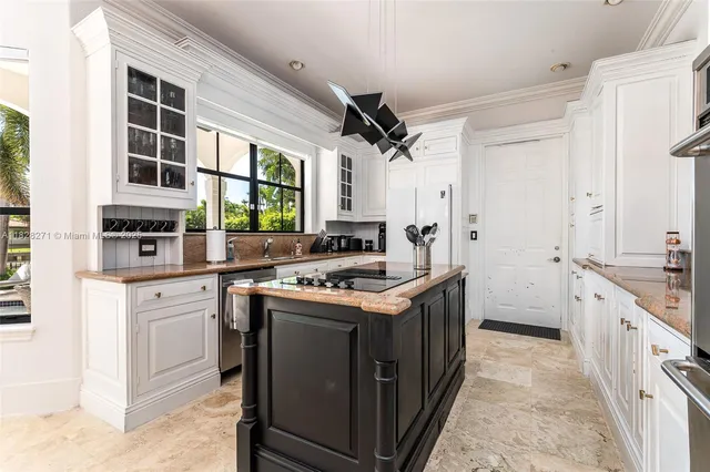 a kitchen with a stove and a sink