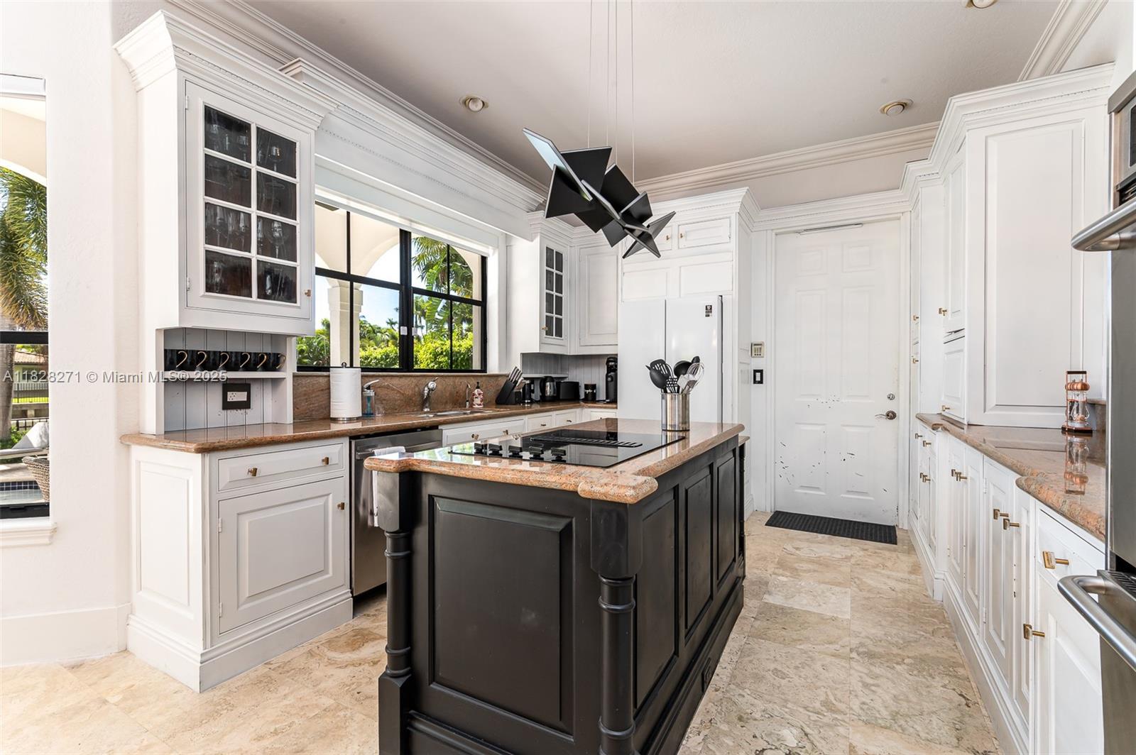 Las Olas Isles Fort Lauderdale, FL 33301 - Photo 12 of 29 a kitchen with a stove and a sink