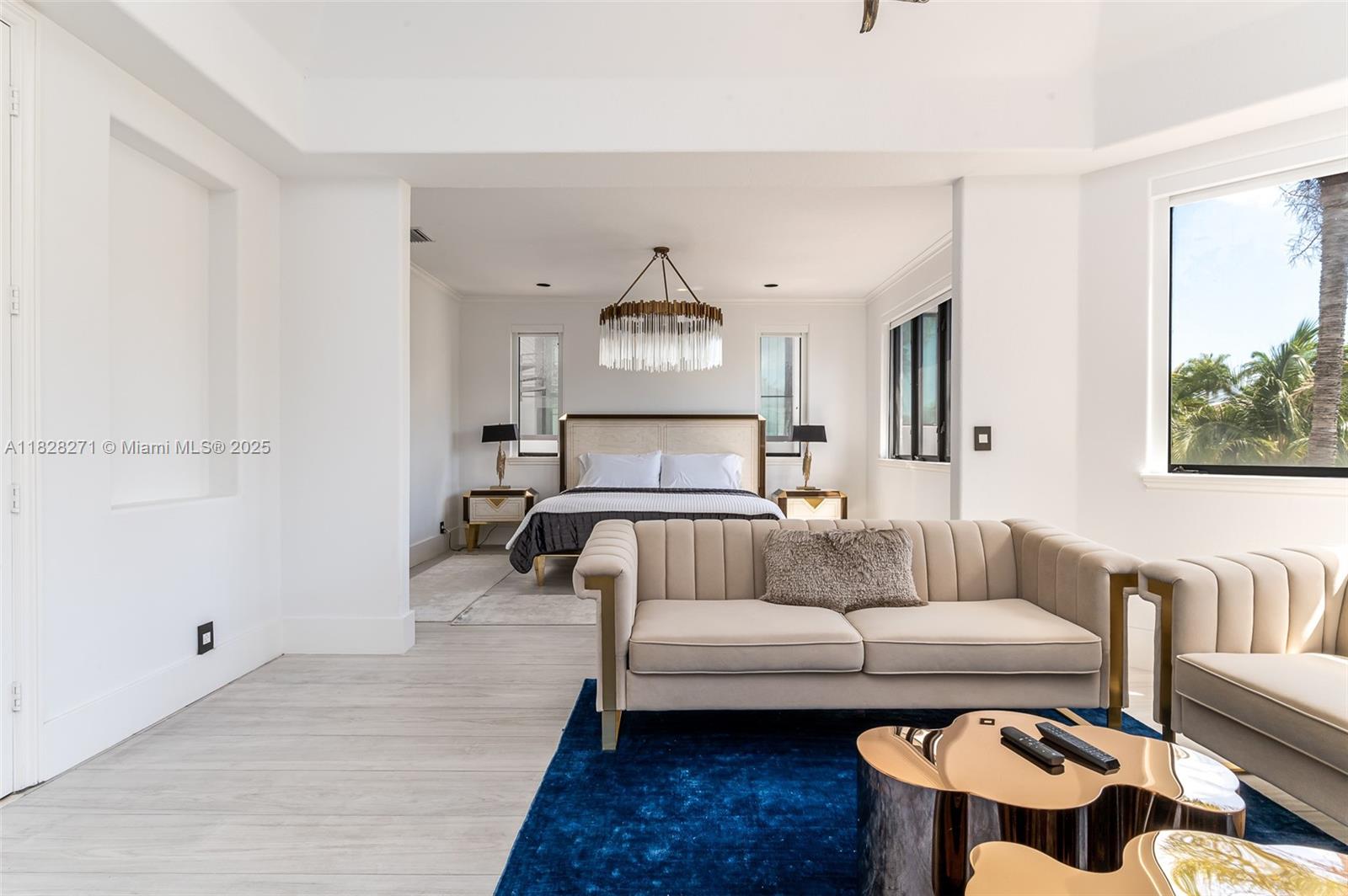 Las Olas Isles Fort Lauderdale, FL 33301 - Photo 18 of 29 a living room with furniture and a fireplace