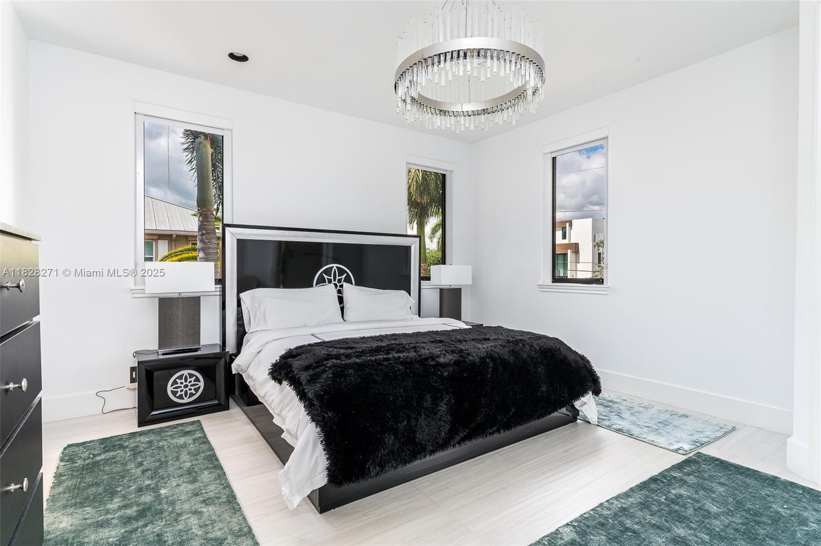 Las Olas Isles Fort Lauderdale, FL 33301 - Photo 20 of 29 a bedroom with a bed and a night stand