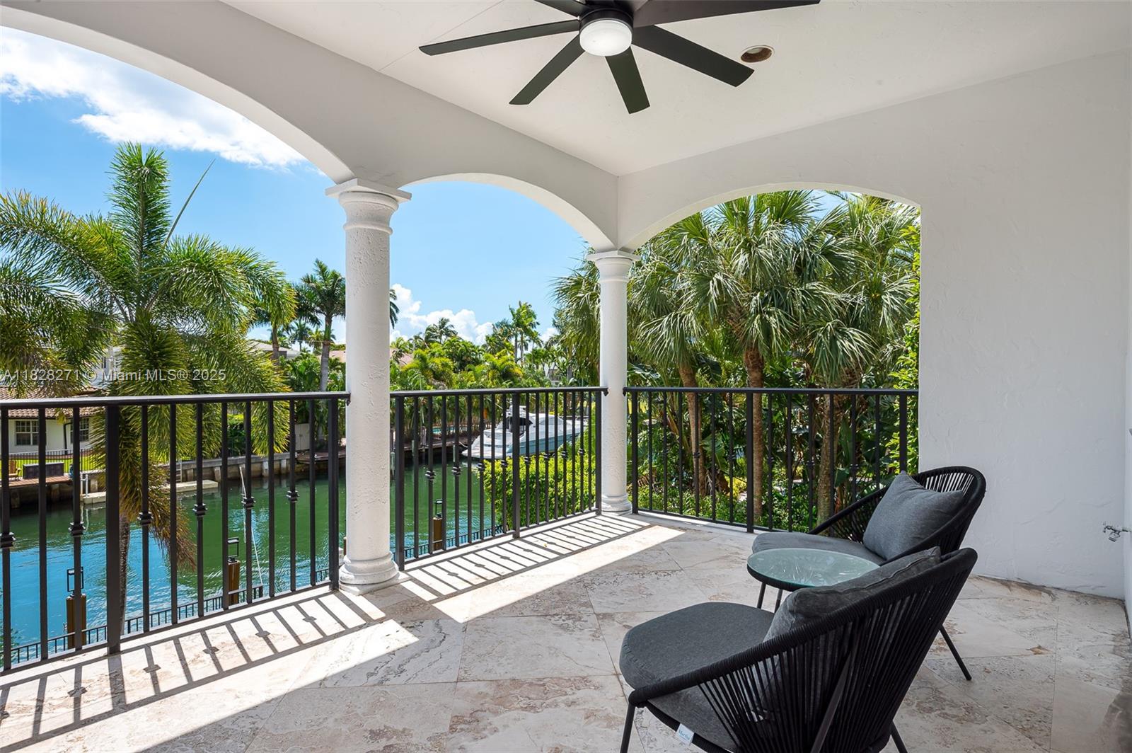 Las Olas Isles Fort Lauderdale, FL 33301 - Photo 27 of 29 a balcony with table and chairs
