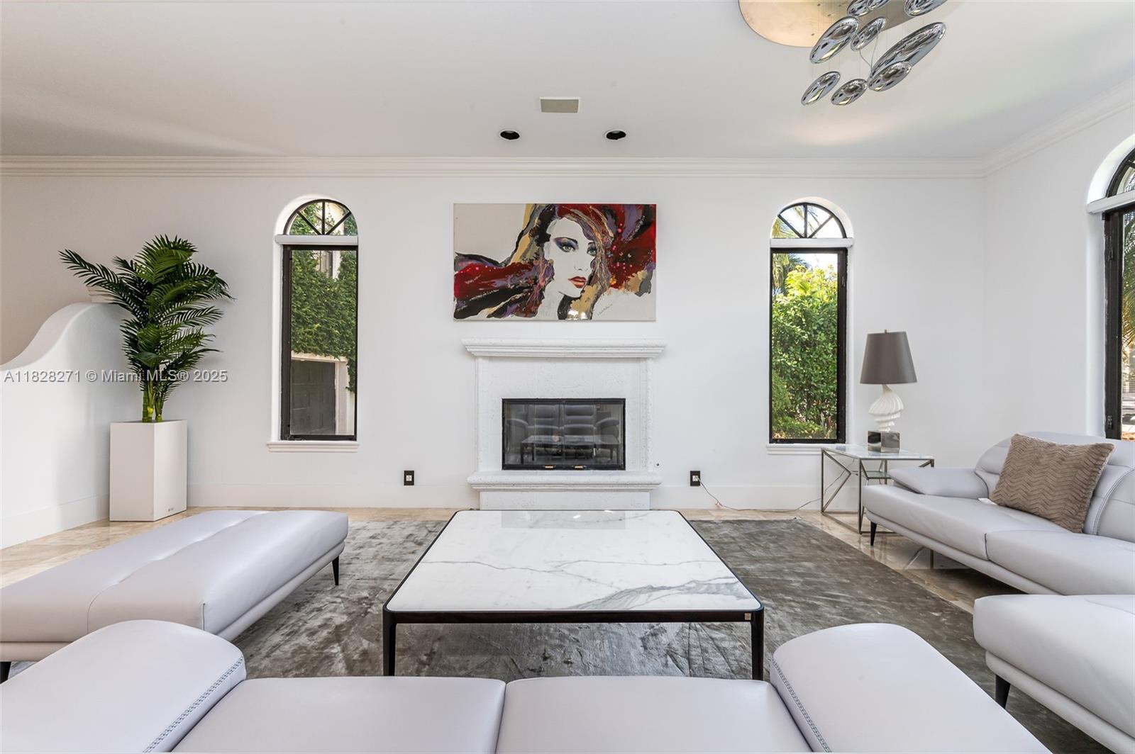 Las Olas Isles Fort Lauderdale, FL 33301 - Photo 10 of 29 a living room with furniture and a fireplace