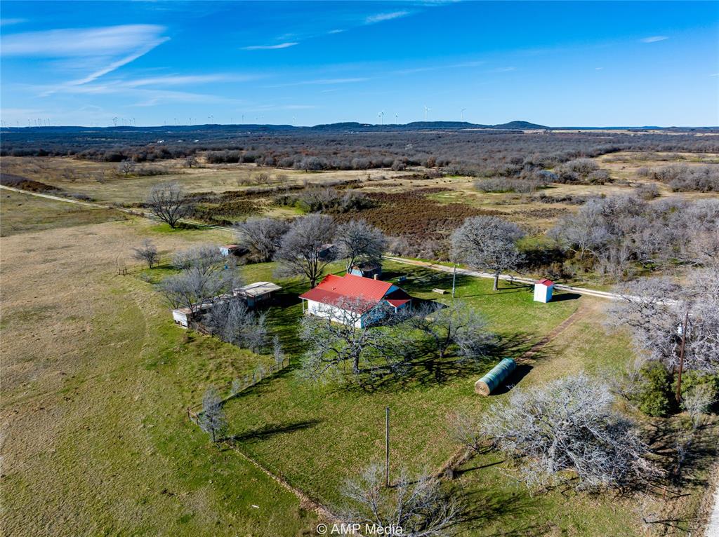 Bird's eye view featuring a rural view and a mountain view