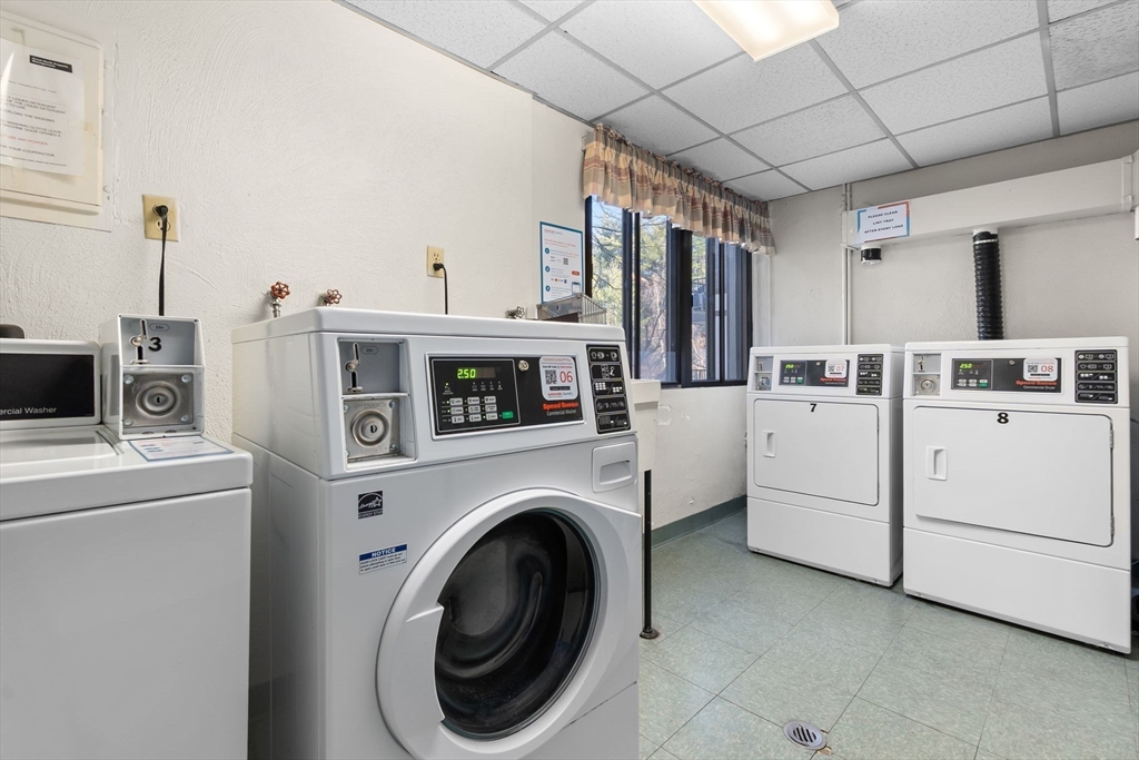 9 Broadway, Unit 210 Saugus, MA 01906 - Photo 21 of 24 a utility room with dryer and washer