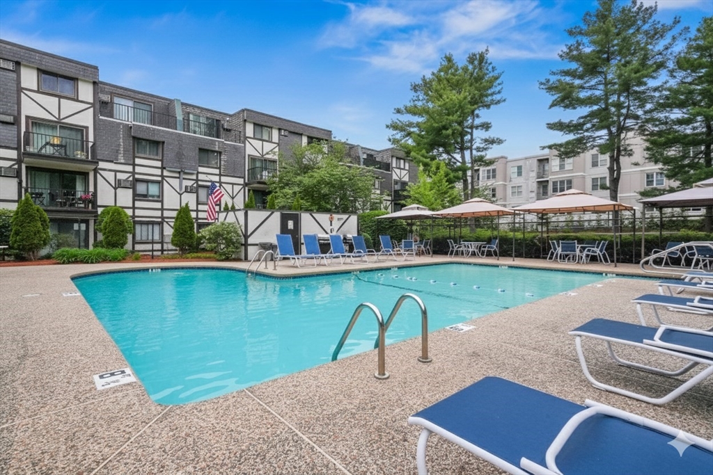 9 Broadway, Unit 210 Saugus, MA 01906 - Photo 24 of 24 a view of a swimming pool with a patio