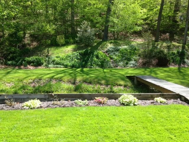 8920 Highland Road Pittsburgh, PA 15237 - Photo 3 of 24 landscape lawn with bridge over creek