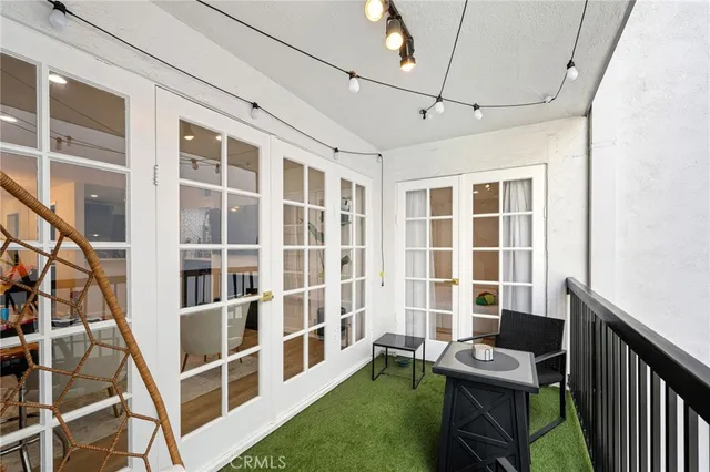 a view of a kitchen with swimming pool and sitting area