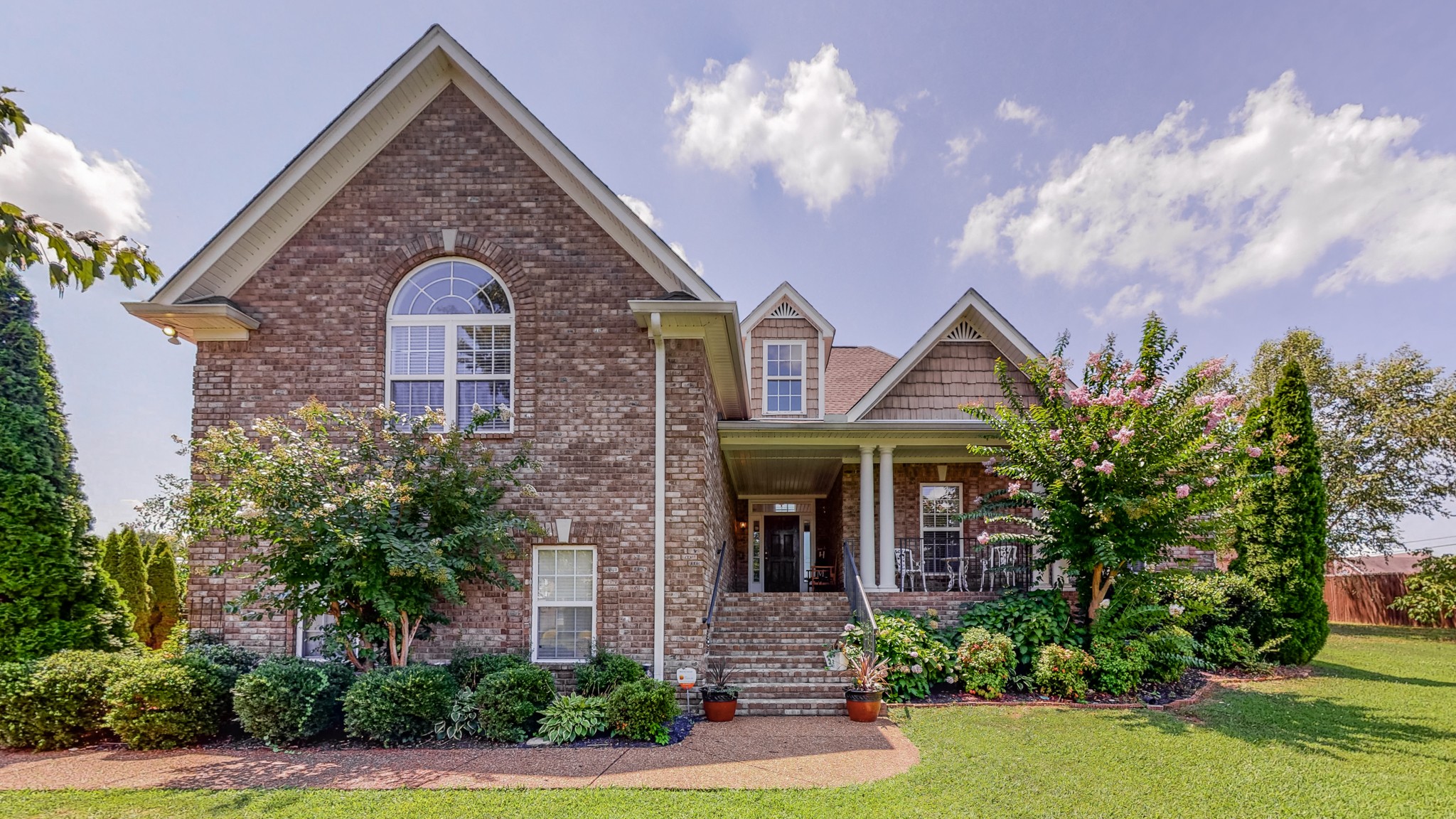 727 Heritage Road Lebanon, TN 37087 - Photo 1 of 58 a front view of a house with garden