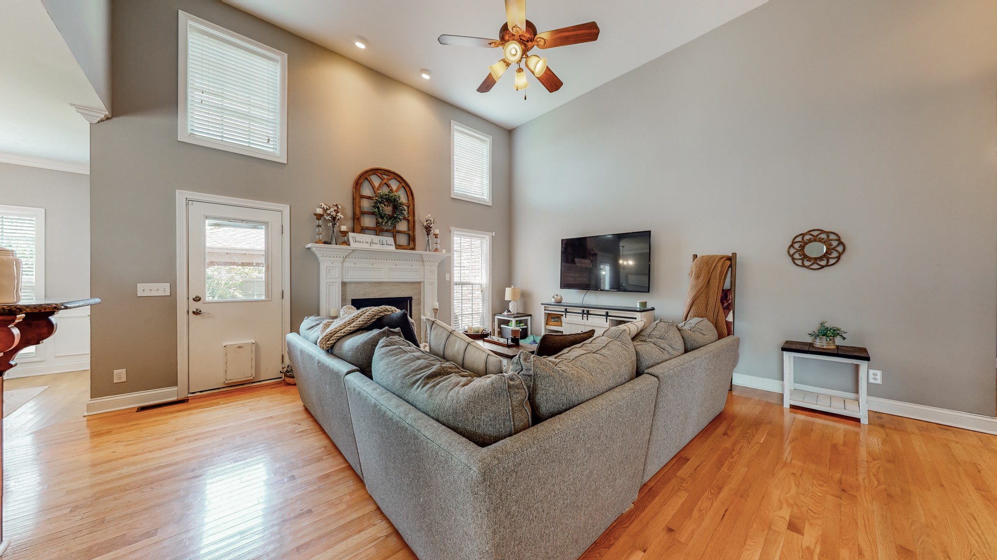 727 Heritage Road Lebanon, TN 37087 - Photo 26 of 58 a living room with furniture and a fireplace
