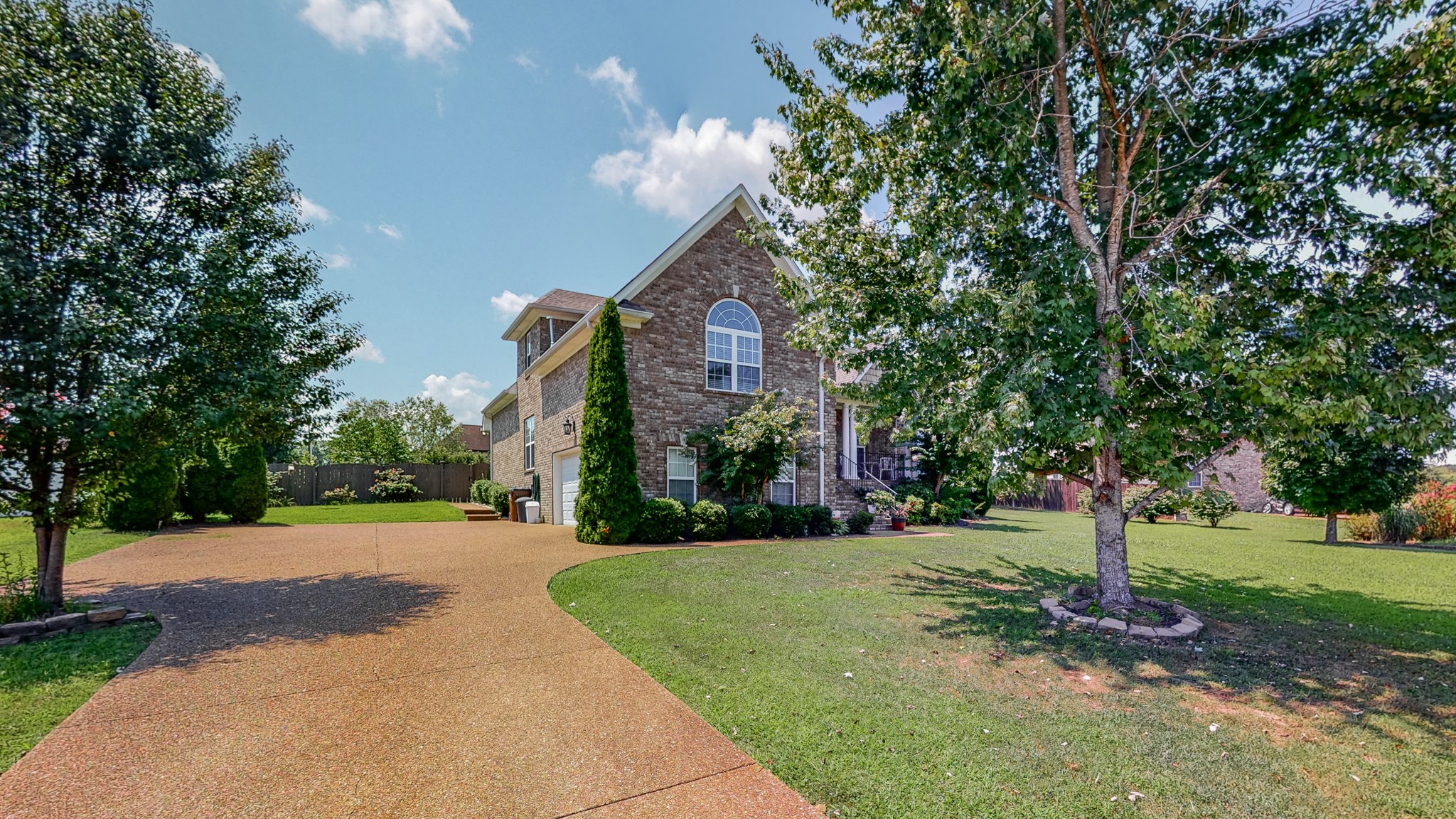 727 Heritage Road Lebanon, TN 37087 - Photo 3 of 58 a front view of a house with a yard and tree s