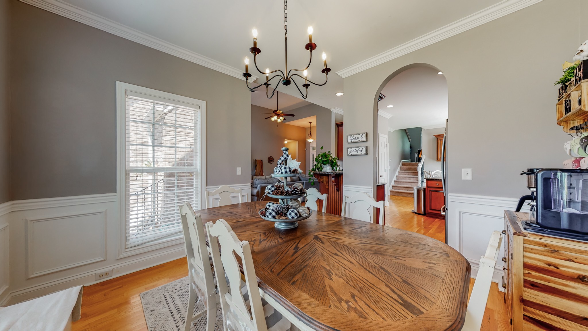 727 Heritage Road Lebanon, TN 37087 - Photo 32 of 58 a view of a dining room with furniture window and wooden floor