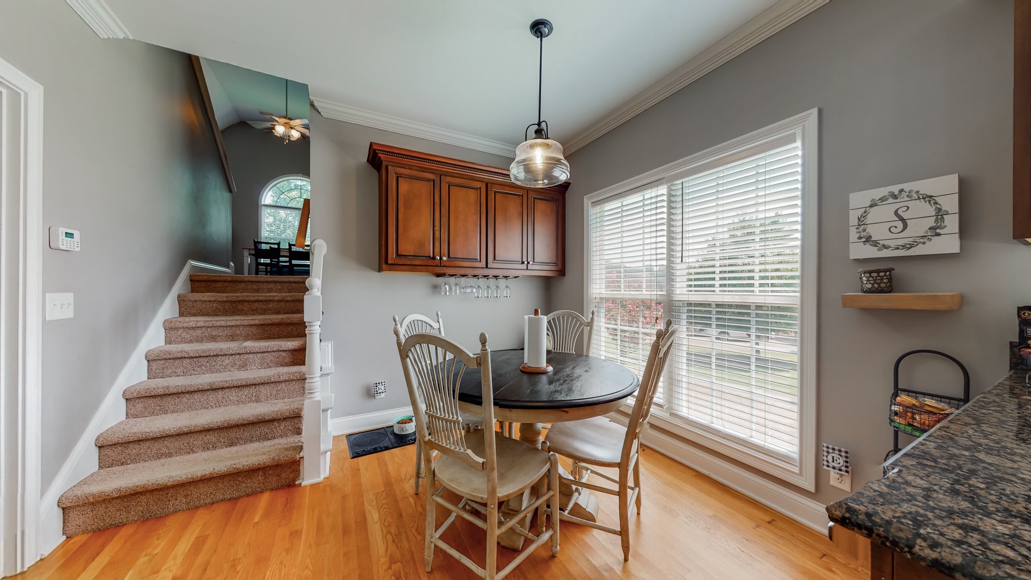 727 Heritage Road Lebanon, TN 37087 - Photo 37 of 58 a view of a dining room with furniture and a chandelier
