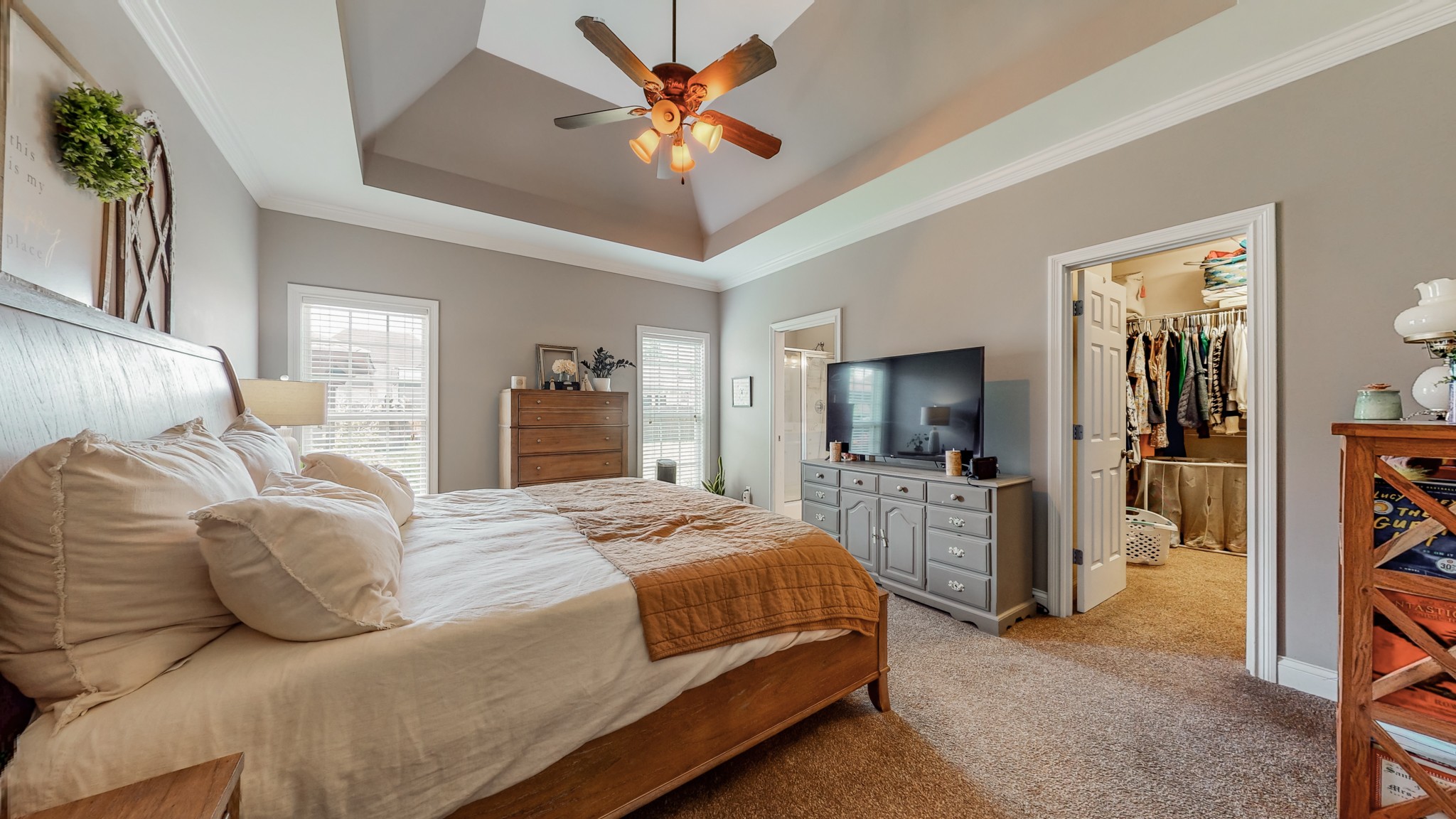 727 Heritage Road Lebanon, TN 37087 - Photo 48 of 58 a bedroom with a bed and a walk in closet