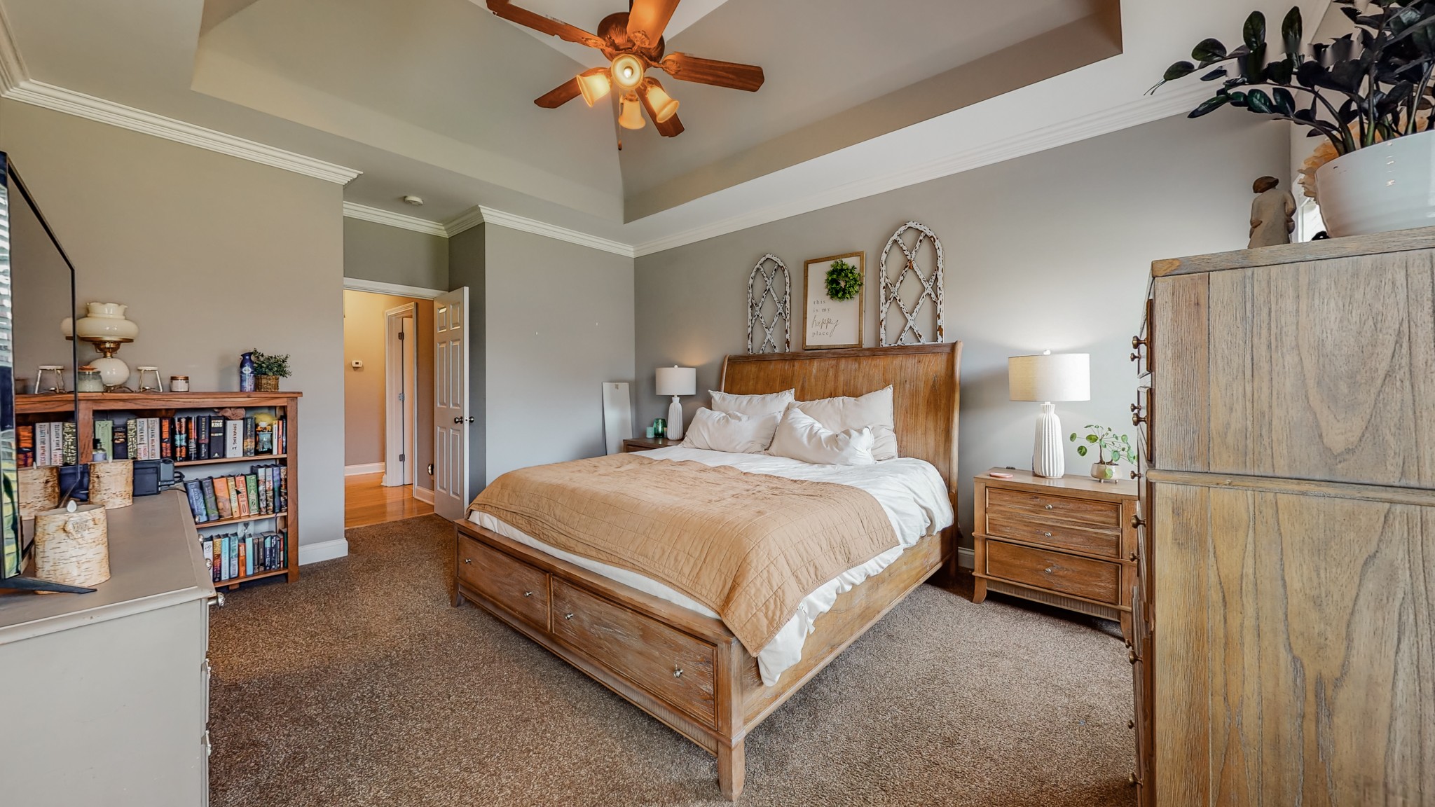 727 Heritage Road Lebanon, TN 37087 - Photo 49 of 58 a bedroom with a bed and a book shelf