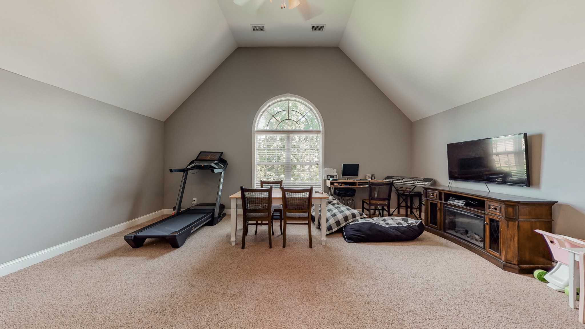 727 Heritage Road Lebanon, TN 37087 - Photo 55 of 58 a view of a livingroom with furniture and a flat screen tv