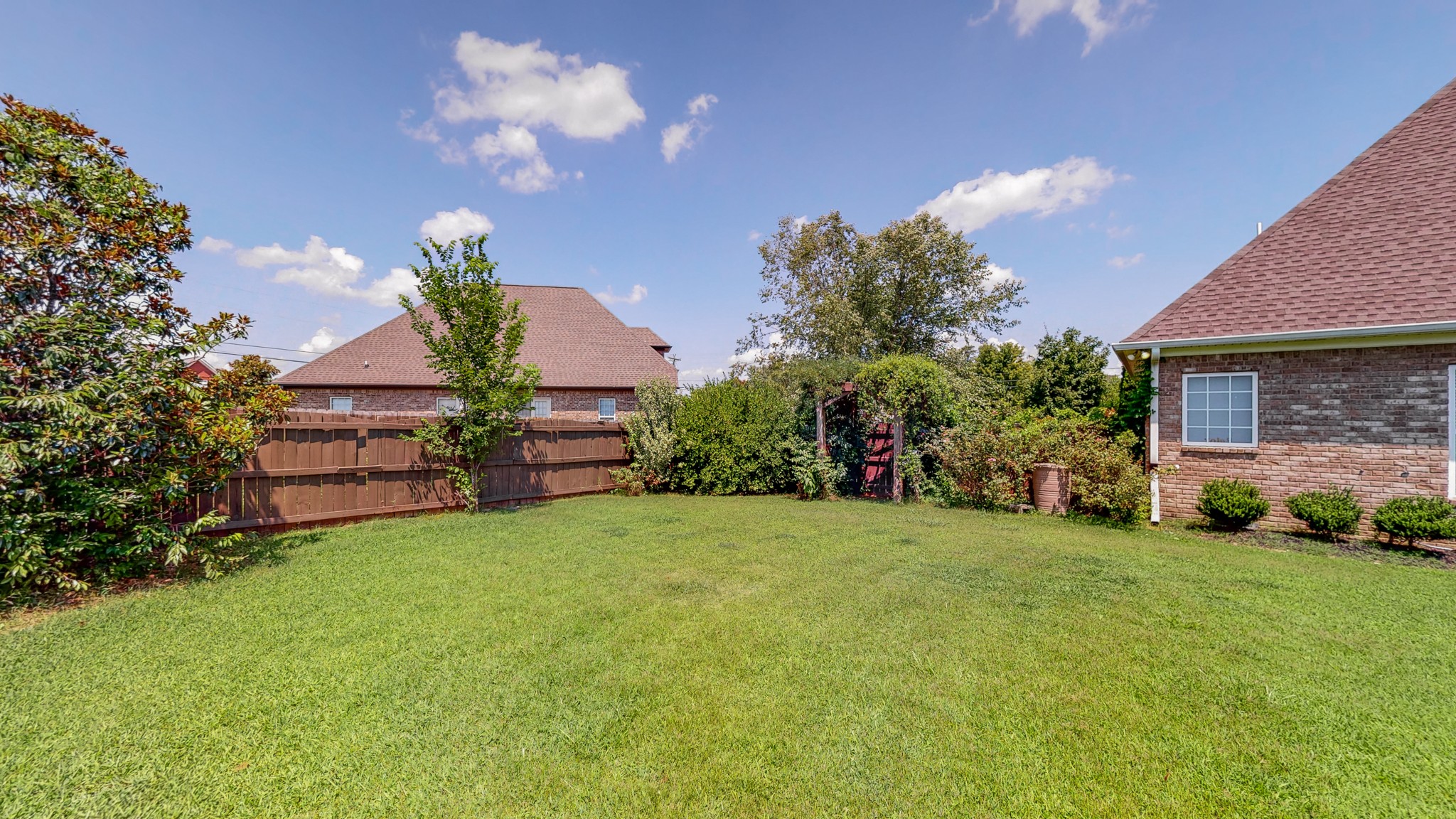 727 Heritage Road Lebanon, TN 37087 - Photo 10 of 58 a front view of a house with a garden