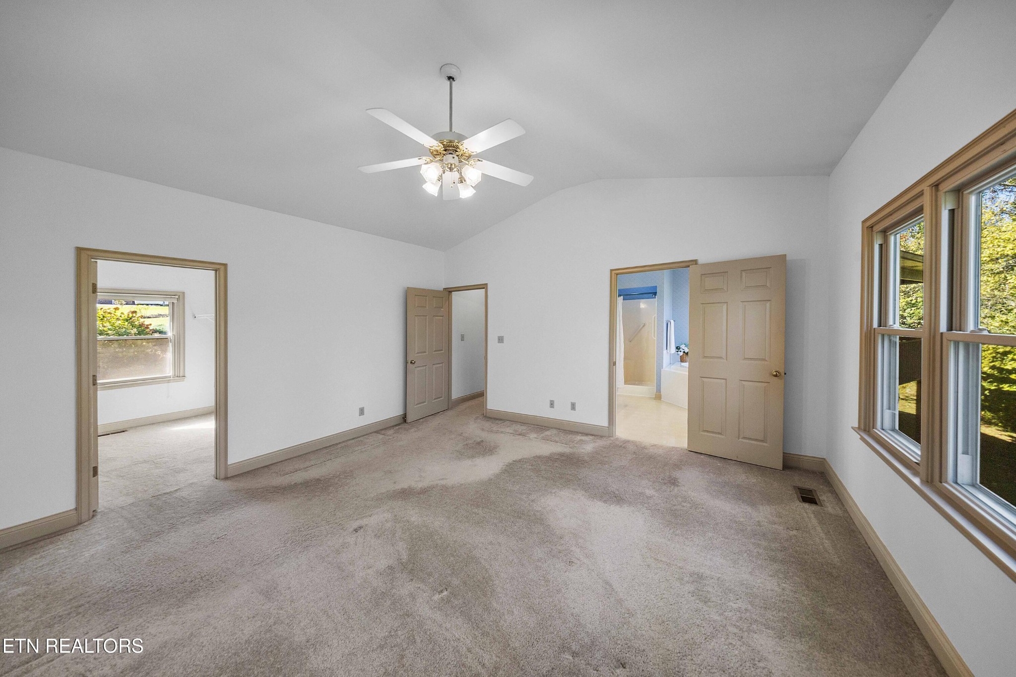 103 Farmington Place Clinton, TN 37716 - Photo 20 of 40 an empty room with fan and windows