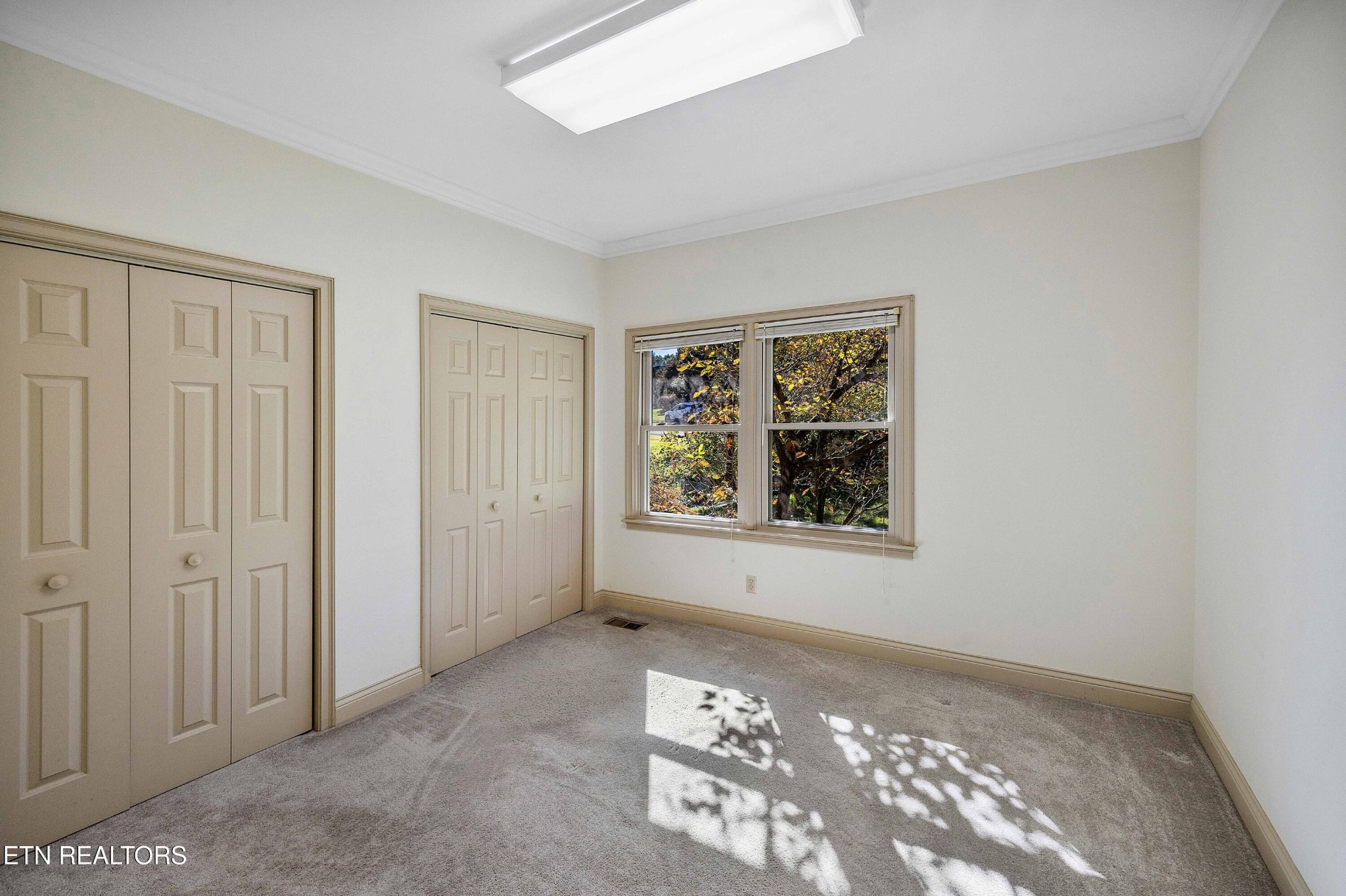 103 Farmington Place Clinton, TN 37716 - Photo 26 of 40 an empty room with windows