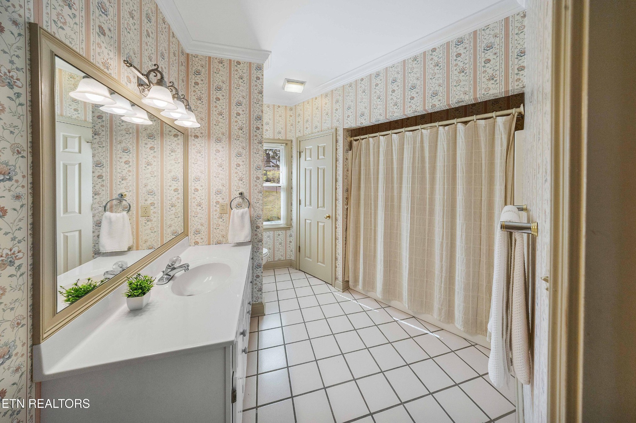 103 Farmington Place Clinton, TN 37716 - Photo 27 of 40 a bathroom with a shower and a sink