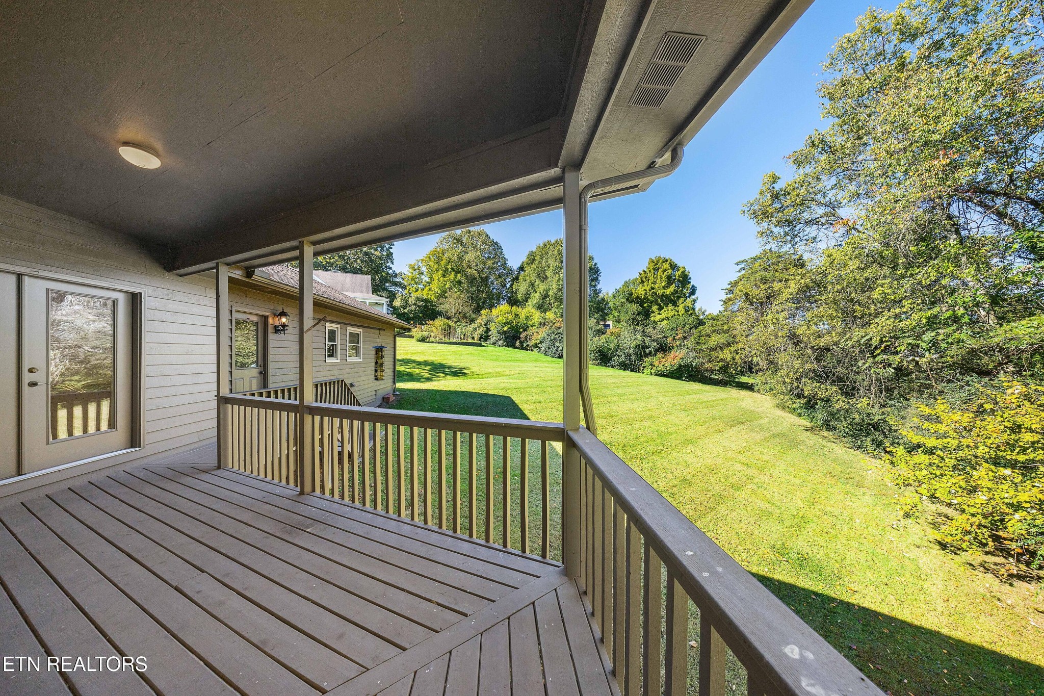 103 Farmington Place Clinton, TN 37716 - Photo 37 of 40 a view of deck with wooden floor and outdoor seating